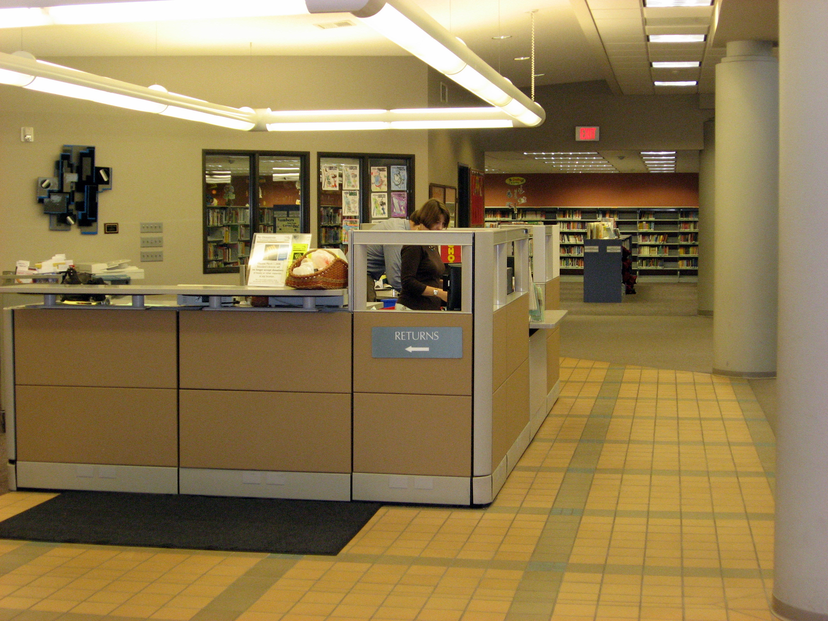 library interior displaying the front desk