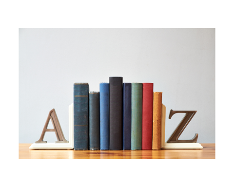 Books on a shelf between an A bookend and a Z bookend