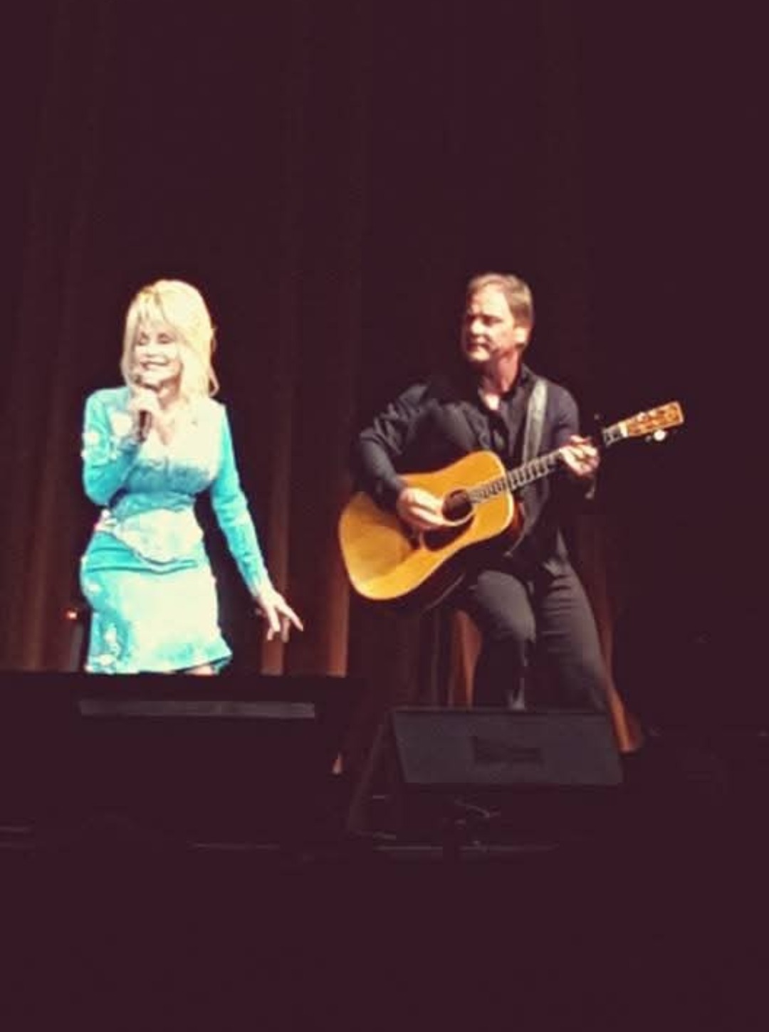 Dolly Parton on stage in Sioux Falls.